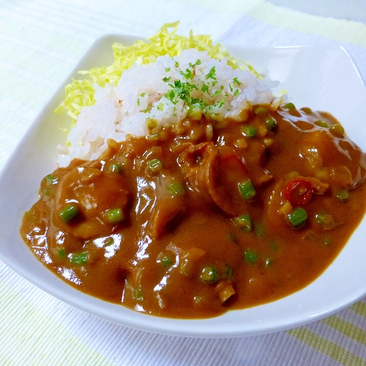 ベビーホタテとにんにくの芽のココナッツ風味カレー